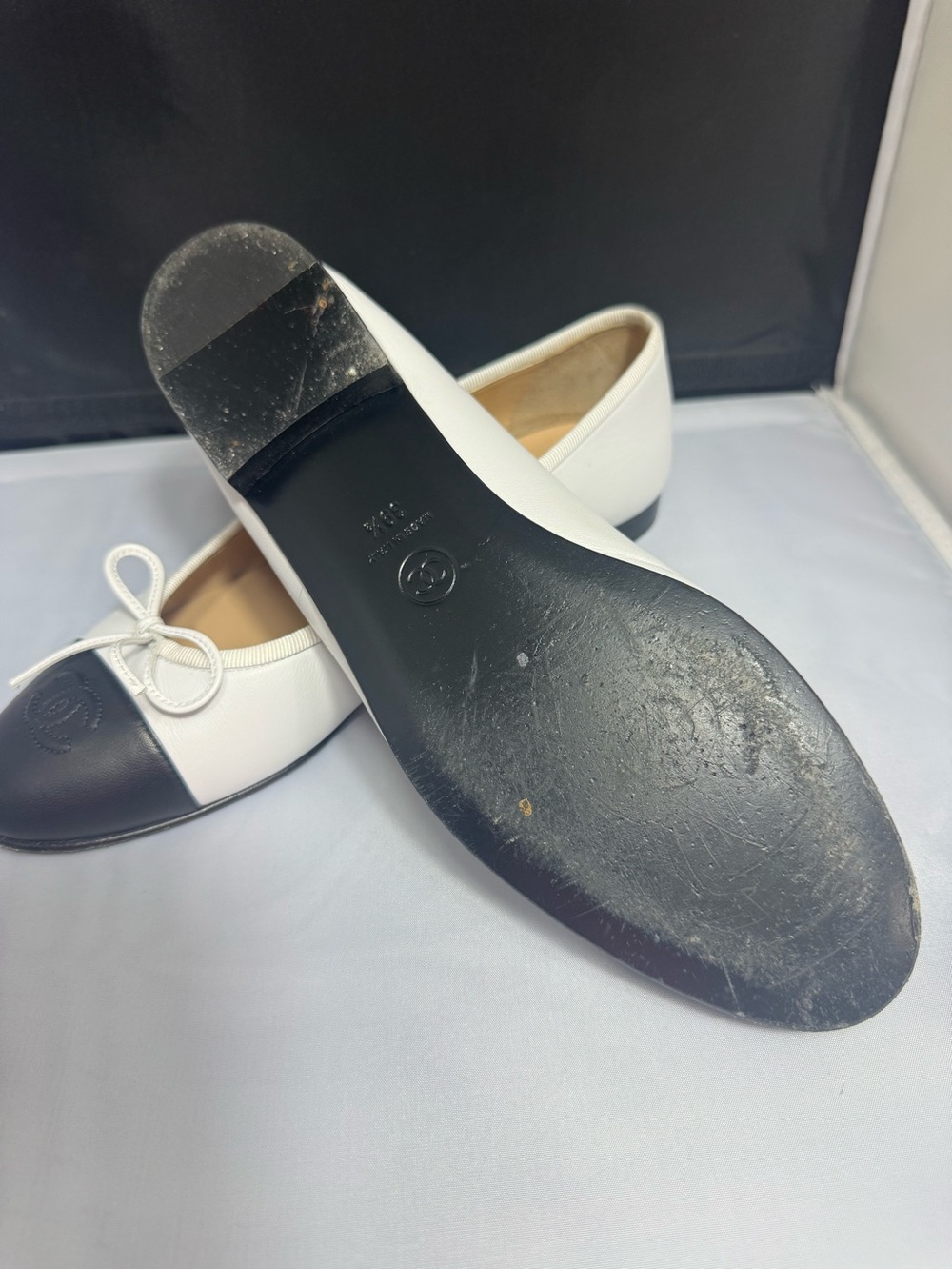 CHANEL Two-Tone White Leather Ballet Flats with Black Cap Toe - Picture 2 of 3